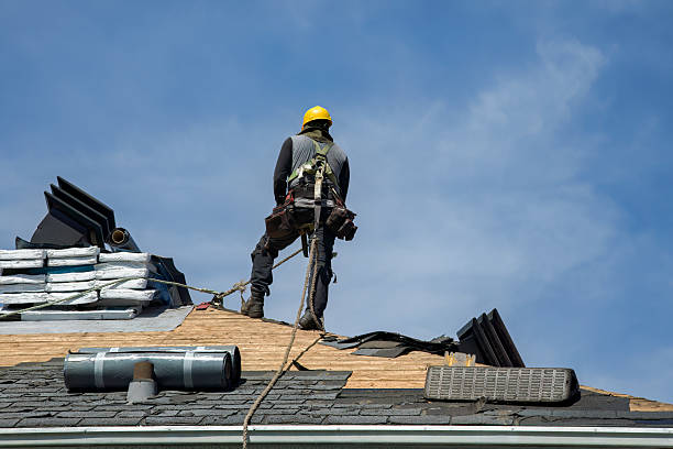 Professional Roof Replacement technician working in Avon, MT